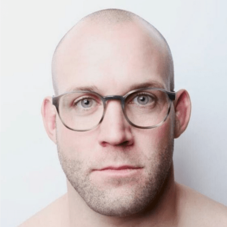 bald man with glasses