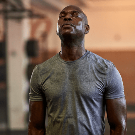Man sweating at the gym