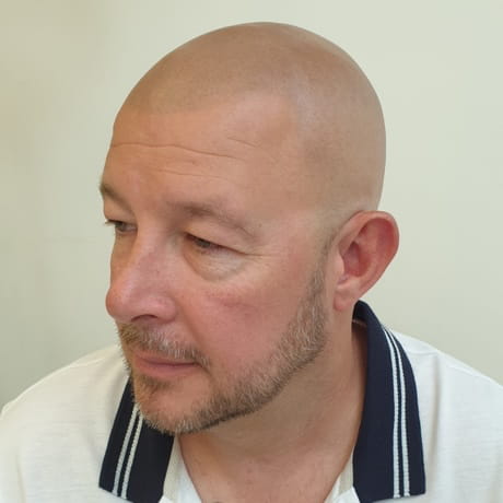 Man with grey beard and SMP