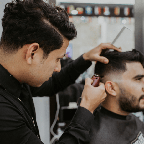 man having haircut